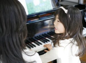 BENEFITS OF PLAYING PIANO